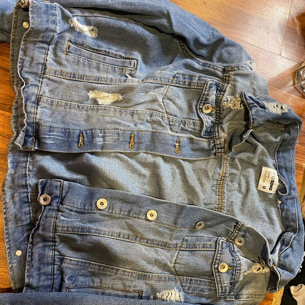 ripped denim jacket
